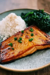 Japanese-inspired salmon with rice and sautéed spinach