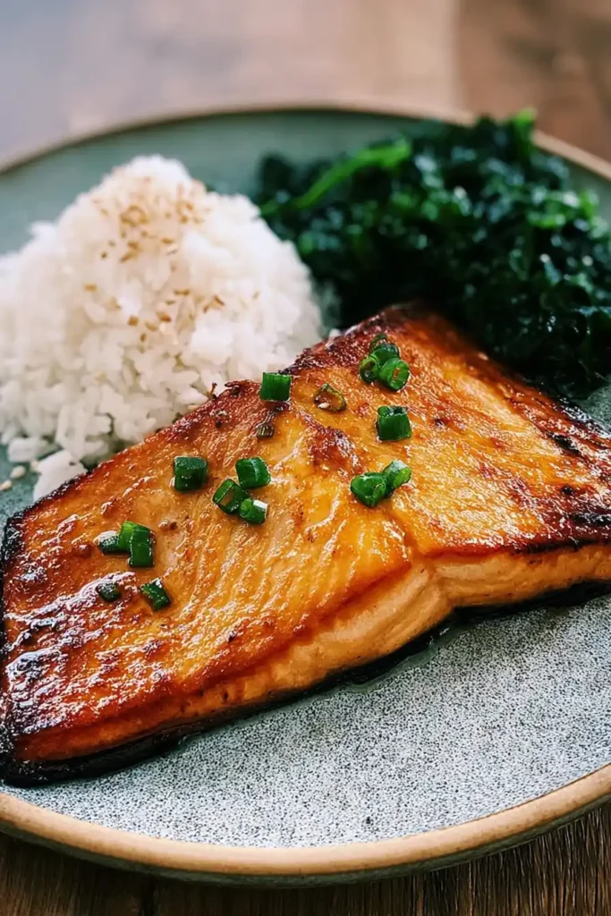 Japanese-inspired salmon with rice and sautéed spinach