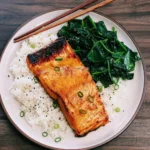 Air Fryer Miso Salmon fillet served with rice and greens