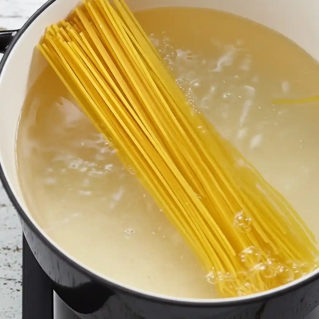 Boiling linguine pasta for shrimp scampi