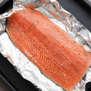 Fresh salmon fillet seasoned and ready for glaze