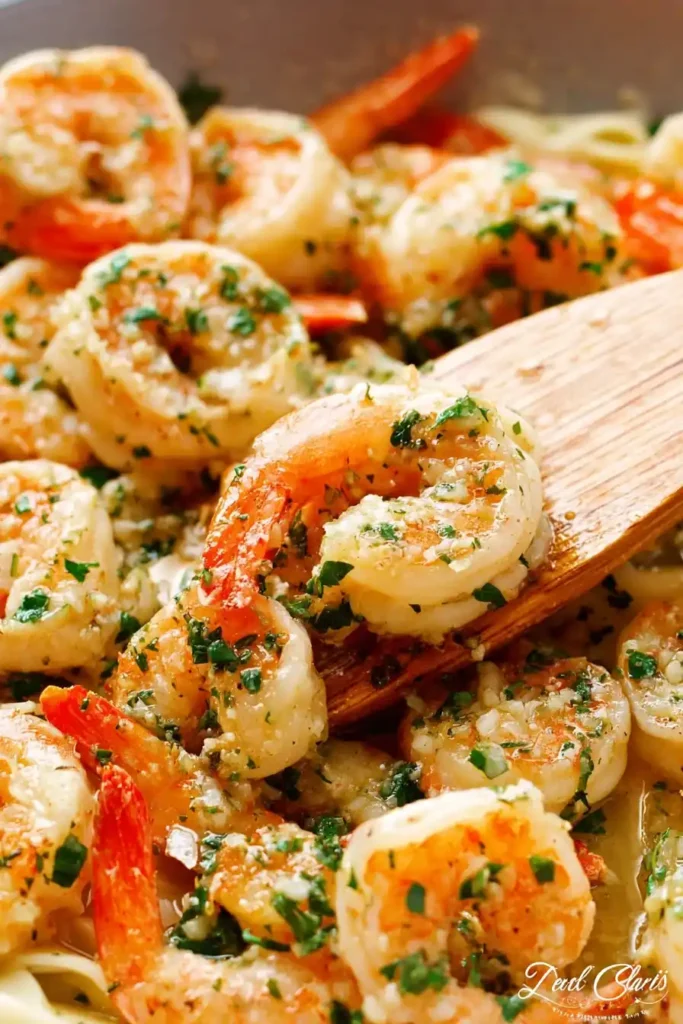 Golden shrimp cooked in a rich garlic-butter sauce with lemon and parsley. Perfect for a quick weeknight dinner.