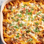 ground beef pasta bake with mozzarella in casserole dish