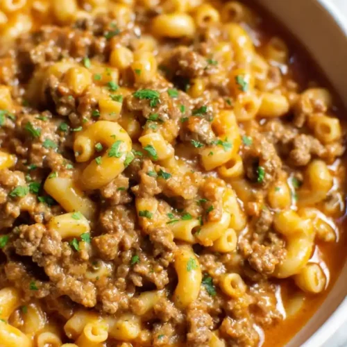 Homemade Hamburger Helper with macaroni and beef in a creamy tomato cheddar sauce