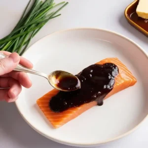 Marinating salmon with miso glaze for Cheesecake Factory recipe