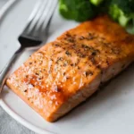 maple bourbon salmon served with broccoli