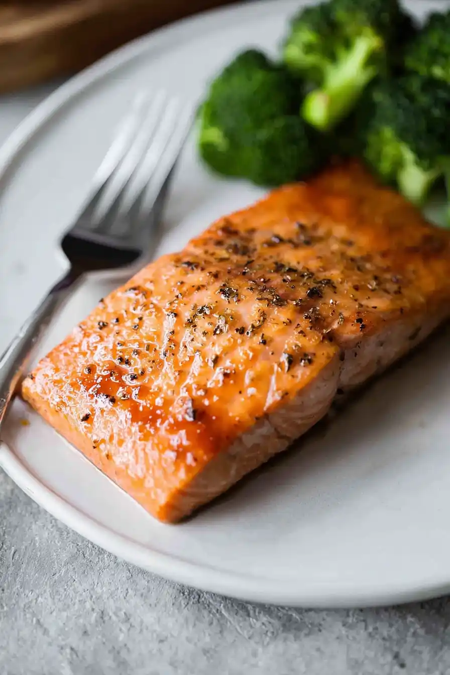 maple bourbon salmon served with broccoli