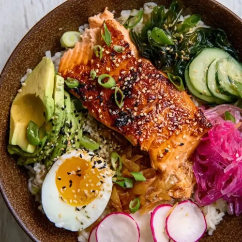 Sticky miso salmon bowl with rice and vegetables