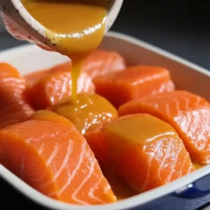 Salmon fillet resting in miso marinade dish