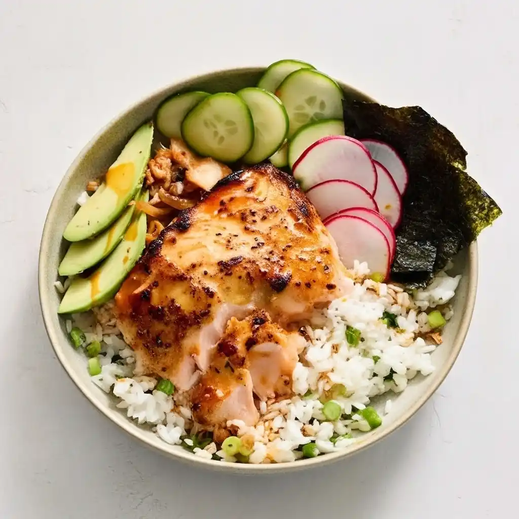 Sticky miso salmon bowl with rice and vegetables