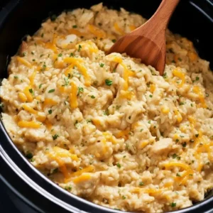 Crock Pot Chicken and Rice Recipe in slow cooker with melted cheese