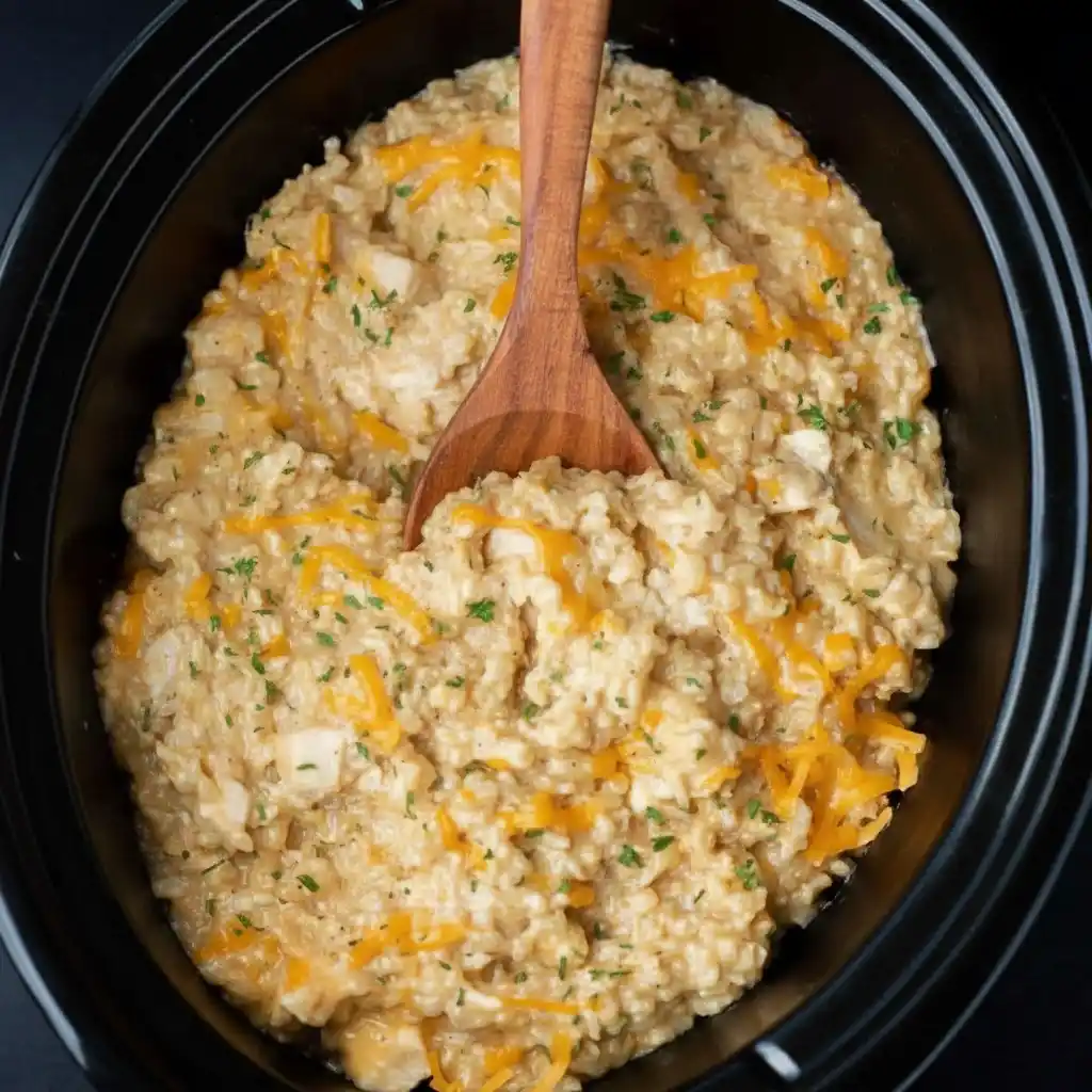 Finished Crock Pot Chicken and Rice Recipe with melted cheddar cheese