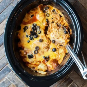 Serving Chicken Enchilada Crockpot Casserole from the slow cooker