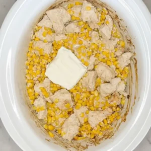 Adding cream cheese to slow cooker street corn chicken