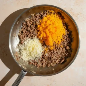 : Ground beef with cheddar and parmesan for Cheeseburger Bomb filling