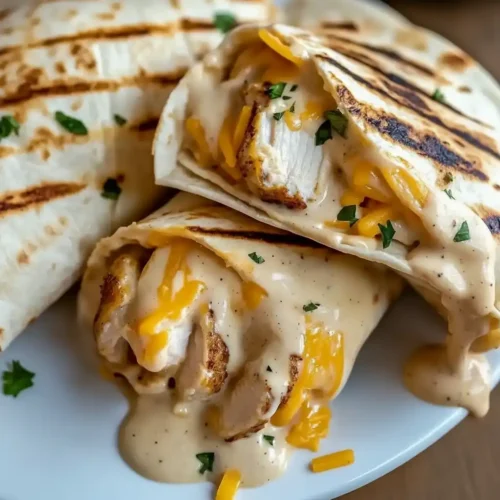 Cheesy Garlic Chicken Wraps with Creamy Garlic Sauce